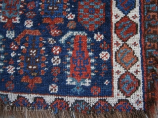 {87} Afshar bag face, 57 X 45 cm, with 19 Boteh (4/5/5/5) and dragon main border. Some lost pile at either end and damaged selvages, but field intact. Great dyes.
-Kolya   