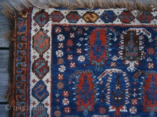 {87} Afshar bag face, 57 X 45 cm, with 19 Boteh (4/5/5/5) and dragon main border. Some lost pile at either end and damaged selvages, but field intact. Great dyes.
-Kolya   