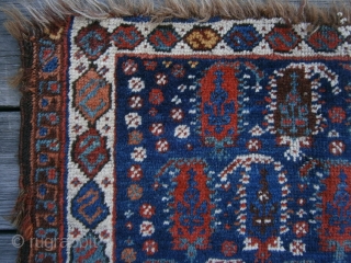 {87} Afshar bag face, 57 X 45 cm, with 19 Boteh (4/5/5/5) and dragon main border. Some lost pile at either end and damaged selvages, but field intact. Great dyes.
-Kolya   