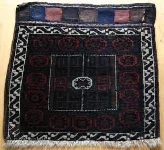 (25) Beludj/ Timuri-group bag face, 75 x 78 cm., featuring "Jewel of Mohammed" 8- pointed star as the central gul and repeated in the main border. The central field surrounding the gul  ...