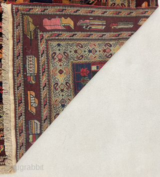 10½ x 13 ft (315 x 390 cm) Afghan war rug from the 1980s. Collector's item, with Kamov helicopters, limousines (Zil?), tanks (T-72?), airplanes (Su-24?), apartment blocks, and civilian and military vehicles.  ...