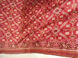 Patola Sari Silk Double ikat.Probably Patan Gujarat.India.this Patola sari has the type of geometric,non figurative pattern particularly favoured by the ismaili Muslim merchant community of the Vohras and its called Vohra-Gaji-Bhat.(Vohra Type  ...