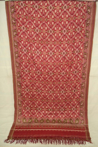 Patola Sari Silk Double ikat.Probably Patan Gujarat.India.this Patola sari has the type of geometric,non figurative pattern particularly favoured by the ismaili Muslim merchant community of the Vohras and its called Vohra-Gaji-Bhat.(Vohra Type  ...