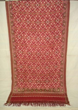 Patola Sari Silk Double ikat.Probably Patan Gujarat.India.this Patola sari has the type of geometric,non figurative pattern particularly favoured by the ismaili Muslim merchant community of the Vohras and its called Vohra-Gaji-Bhat.(Vohra Type  ...