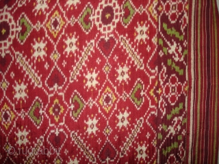 Patola Sari Silk Double ikat.Probably Patan Gujarat.India.this Patola sari has the type of geometric,non figurative pattern particularly favoured by the ismaili Muslim merchant community of the Vohras and its called Vohra-Gaji-Bhat.(Vohra Type  ...