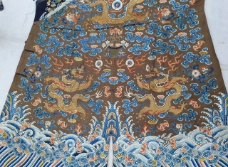 A very large and Beautiful Imperial Chinese dragon robe. Kesi woven with 9 dragons in pursuit of pearls among multicolour silk clouds, bats, and daoist symbols above wave and rock band. 19th  ...