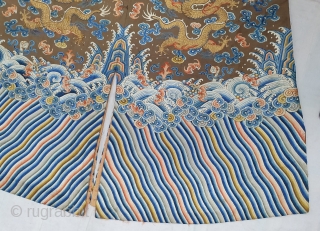 A very large and Beautiful Imperial Chinese dragon robe. Kesi woven with 9 dragons in pursuit of pearls among multicolour silk clouds, bats, and daoist symbols above wave and rock band. 19th  ...