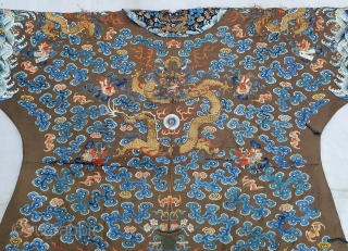 A very large and Beautiful Imperial Chinese dragon robe. Kesi woven with 9 dragons in pursuit of pearls among multicolour silk clouds, bats, and daoist symbols above wave and rock band. 19th  ...