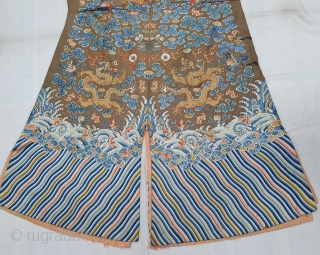 A very large and Beautiful Imperial Chinese dragon robe. Kesi woven with 9 dragons in pursuit of pearls among multicolour silk clouds, bats, and daoist symbols above wave and rock band. 19th  ...