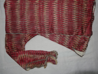 Ikat Mashru costume From Deccan, India. This Mashru weaving done in Deccan,Probably Hyderabad South India, Its Silk And Cotton Ikat with Stripes.Its size is L-62cm,W55cm,S-14cmX48cm(DSC04465 New).       