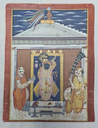 Miniature Painting of  Mangla Darshan of Shrinathji, From The Nathdwara of Rajasthan. India.

Mangala Darshan  First darshan of the day. Lord, having woken up, has just had His breakfast and greets  ...