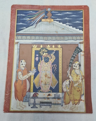 Miniature Painting of  Mangla Darshan of Shrinathji, From The Nathdwara of Rajasthan. India.

Mangala Darshan  First darshan of the day. Lord, having woken up, has just had His breakfast and greets  ...