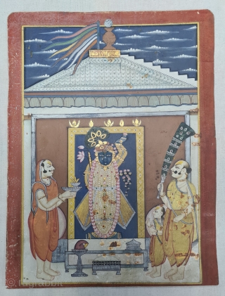 Miniature Painting of  Mangla Darshan of Shrinathji, From The Nathdwara of Rajasthan. India.

Mangala Darshan  First darshan of the day. Lord, having woken up, has just had His breakfast and greets  ...