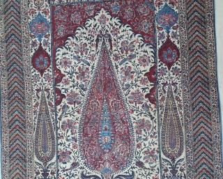 Kalamkari Palampore from South India. India. Made for Export Market, Printed cotton with exotic birds, peacocks, tigers, stylized mountain and cypress trees all within mihrab. Surrounded by lozenge border Cotton backing. Late  ...