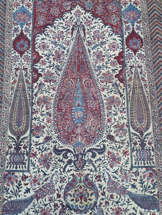 Kalamkari Palampore from South India. India. Made for Export Market, Printed cotton with exotic birds, peacocks, tigers, stylized mountain and cypress trees all within mihrab. Surrounded by lozenge border Cotton backing. Late  ...