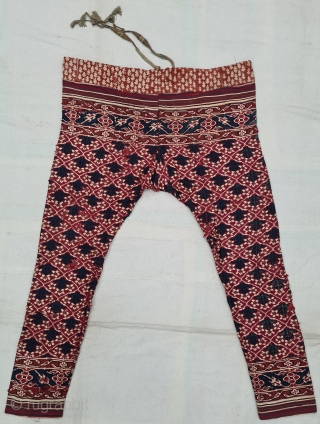 Ejar (Trouser) Silk Double Ikat,Probably Patan Gujarat. India.This Patola Design Ejar known as Tran-Phul-Bhat (there flowers design) Design. C.1825-1850. Its size is W-115cm, L-103cm (20210211_145239).        