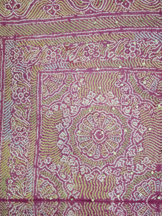 Tie dyed (resist dyed technique) head Odhani Or Dupatta. Tie dyed on thin hand woven cotton fabric with extra additional shibori (stitched resist dye) technique in the middle. With Real Zari Gota-Patti  ...