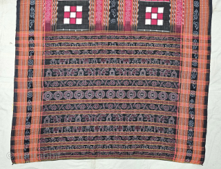 An Rare Cotton Dashphulia Saktapaar Domuha Saree From  West Odisha.

Plain weave with compound and double ikat, supplementary warp and continuous supplementary weft

20th Century 

120cm x 510cms

The checkerboard pattern in the field  ...