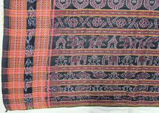 An Rare Cotton Dashphulia Saktapaar Domuha Saree From  West Odisha.

Plain weave with compound and double ikat, supplementary warp and continuous supplementary weft

20th Century 

120cm x 510cms

The checkerboard pattern in the field  ...