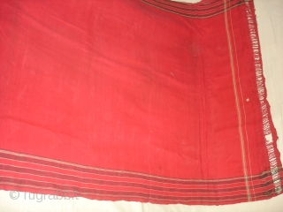 Temple Sari From Orissa, an eastern state India,on the Bay of Bengal.Sari is made of red cotton bordered by black stripes,the plain weave supplemented by bands of both warp and weft.Its size  ...