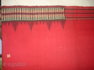 Temple Sari From Orissa, an eastern state India,on the Bay of Bengal.Sari is made of red cotton bordered by black stripes,the plain weave supplemented by bands of both warp and weft.Its size  ...