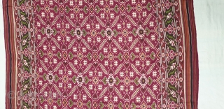 Patola Sari Silk Double ikat.Probably Patan Gujarat. India. this Patola sari has the type of geometric,non figurative pattern particularly favored by the ismaili Muslim merchant community of the Vohras.And its called Vohra-Gaji-Bhat.(Vohra  ...