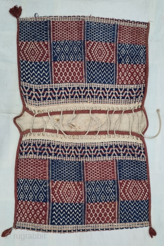 Donkey Saddle bag,A bound weaving of thick Hand Woven cotton with Natural Dyes.Having the Raw of Human Figures motif.
Used as a salt sack,
From Saurashtra, Gujarat, India.
C.1875-1900.
Its size is 75cmX120cm(20220215_162334).     