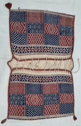 Donkey Saddle bag,A bound weaving of thick Hand Woven cotton with Natural Dyes.Having the Raw of Human Figures motif.
Used as a salt sack,
From Saurashtra, Gujarat, India.
C.1875-1900.
Its size is 75cmX120cm(20220215_162334).     