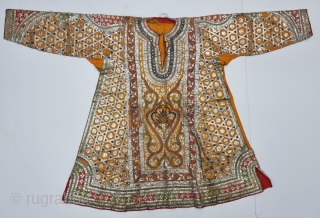 Ceremonial Kurta, Women's Costume, From Himachal Pradesh India. A Orange Kurta With Dazzling Embroidery using Gota and Coloured fabric Strips, Silk ground with Real Zari Gota Pati work And Real Zari Embroidery. 

Late 19th Century.

Its size  ...