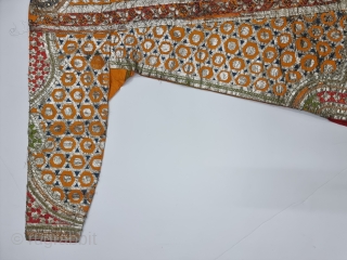 Ceremonial Kurta, Women's Costume, From Himachal Pradesh India. A Orange Kurta With Dazzling Embroidery using Gota and Coloured fabric Strips, Silk ground with Real Zari Gota Pati work And Real Zari Embroidery. 

Late 19th Century.

Its size  ...