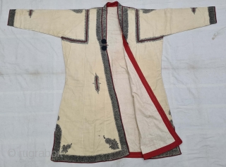 A Kashmir Embroidery Choga (Coat) Borders with Keri butis, From Kashmir, India. India. There are imitation pockets in the front and similar motifs on the sleeves, The back and Shoulders are Decorated with Elaborate  ...