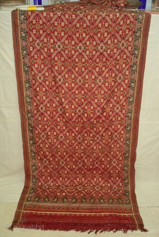 Patola Sari Silk Double ikat.Probably Patan Gujarat.India.19th Century.this Patola sari has the type of geometric,non figurative pattern particularly favoured by the ismaili Muslim merchant community of the Vohras.And its called Vohra-Gaji-Bhat.(Vohra Type  ...