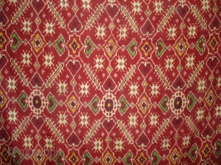 Patola Sari Silk Double ikat.Probably Patan Gujarat.India.19th Century.this Patola sari has the type of geometric,non figurative pattern particularly favoured by the ismaili Muslim merchant community of the Vohras.And its called Vohra-Gaji-Bhat.(Vohra Type  ...