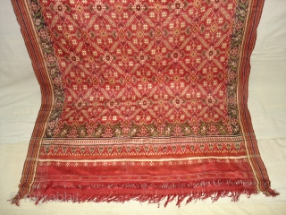 Patola Sari Silk Double ikat.Probably Patan Gujarat.India.19th Century.this Patola sari has the type of geometric,non figurative pattern particularly favoured by the ismaili Muslim merchant community of the Vohras.And its called Vohra-Gaji-Bhat.(Vohra Type  ...