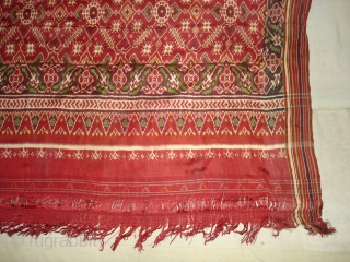 Patola Sari Silk Double ikat.Probably Patan Gujarat.India.19th Century.this Patola sari has the type of geometric,non figurative pattern particularly favoured by the ismaili Muslim merchant community of the Vohras.And its called Vohra-Gaji-Bhat.(Vohra Type  ...