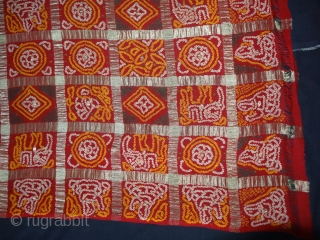 Gharchola  the Wedding Saree (also known as Ghatchola and Gharcholu) from Gujarat, India. This were  woven on Cotton fabric in large checks of using Real Zari threads. This is further  ...