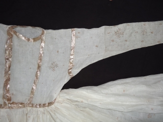 Angarkha(Coat)Man's Costume fine Muslin Cotton with Gota Pati and Badala work,with front opening,with large skirt shape, From Lucknow ,Utter Pradesh. India.C.1900.Worn by Royal Nawab Muslims Family Of Lucknow.Its size is L-150cm,S-16X62cm,Skirt circle  ...