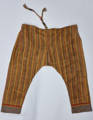 Ikat Mashru Trouser (Ejar) From Deccan, India. This Mashru weaving is done in Deccan, Probably Hyderabad South India, Its Silk And Cotton Ikat with Stripes.

C.1875-1900.

Its size is L-80cm,W-106cm (20230306_163913).    