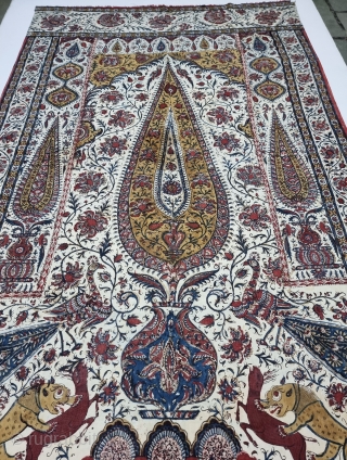 Kalamkari Palampore from South India. India. 
Hand-Drawn Mordant-And Resist-Dyed Cotton, with exotic birds, peacocks, tigers, stylized mountain and cypress trees all within mihrab.

Made for Export Market, 

Late 19th Early 20th Century. 

Its  ...