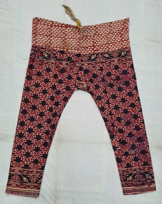 Ejar (Trouser) Silk Double Ikat, Probably Patan Gujarat. India.T his Patola Design Ejar known as Tran-Phul-Bhat (there flowers design) Design. c.1825-1850. Its size is W-128cm, L-115cm (20210310_160418).      