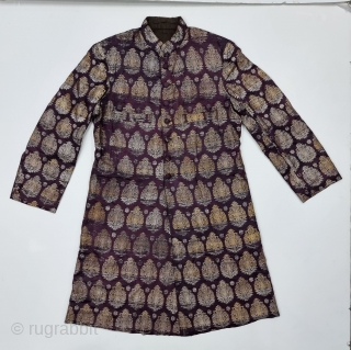 An very Unique Achkan (Coat) Real Zari Brocade (Real Zari)  With Fine Floral Butas in Weaving on Gold and Silver Thread  Lined with Cotton From the Varanasi Uttar Pradesh, India.
C.1900-1925. 
Its size is  ...