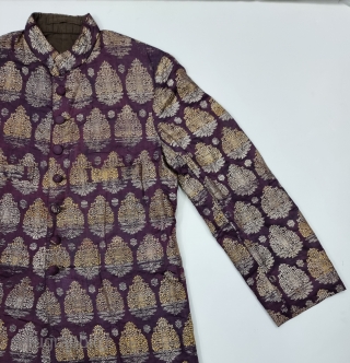 An very Unique Achkan (Coat) Real Zari Brocade (Real Zari)  With Fine Floral Butas in Weaving on Gold and Silver Thread  Lined with Cotton From the Varanasi Uttar Pradesh, India.
C.1900-1925. 
Its size is  ...