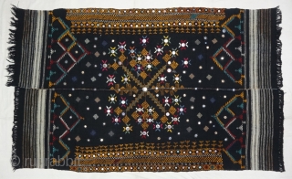 Embroidered woolen wedding shawl (Odhani )from the Thar Desert region of Jaisalmer district of Rajasthan, India.The background cloth is two parts of Black handloomed wool cloth (Probably camel wool) that have been  ...