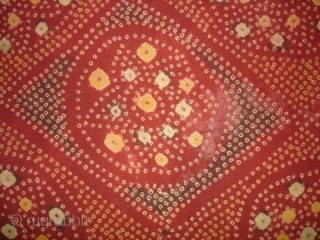 Single Bandh Tie and Dye Odhani From Shekhawati District of Rajasthan. India.Its Very rare Single Bandh Tie and Dye Odhani. Natural Colours On the Khadi Cotton.C.1900.Its size is 145CmX200cm(DSC04960 New).   