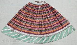 An very Rare Ikat Mashru Ghaghra Skirt , With Real silver Gota patti lace work on it.This Mashru weaving was done in the Deccan Region,Probably Hyderabad South India, Its Multi colour Lehariya Wave  ...