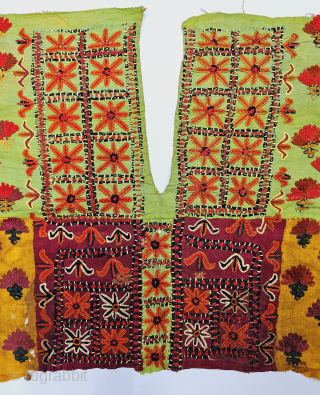 Gaj - Embroidered Blouse front of the wedding dress.

Having Floral embroidery style using floss silk threads and glass mirrors on silk and Silk base.

Made and used by the ladies of Meghwar community

Probably  ...
