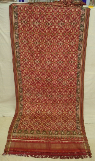 Patola Sari Silk Double ikat.Probably Patan Gujarat.India.19th Century.this Patola sari has the type of geometric,non figurative pattern particularly favoured by the ismaili Muslim merchant community of the Vohras.and its called Vohra-Gaji-Bhat.(Vohra Type  ...