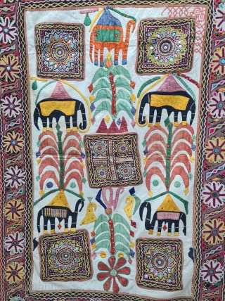 One of the best and rarest example of Dharaniya  Applique Wall Hanging . 
Appliqued with silk and cotton on cotton base with embroidery and decorated with pom-poms with  mirror work,
Made and used by  ...