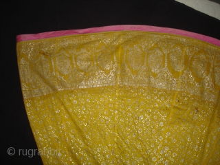 Ghaghra (Skirt) From Rajasthan, India. Made of Silver Tinsel on Yellow Malmal Cloth.This were traditionally used mainly by Rajput family of Rajasthan.Its size is L-88cm Around-270cm(DSC05147 New).      