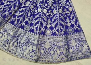 Wedding Lehenga  (Skirt) Zari (Real Silver) Brocade From Varanasi,  Uttar Pradesh. India.Known As Marwadi Lehenga. The lehenga is fashioned from silk and real gold-polished silver zari. The silk is a deep purple while  ...